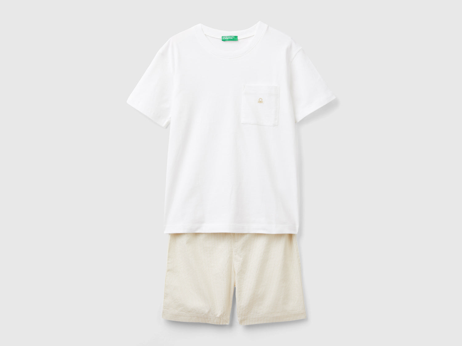 Pigiama con shorts a righe da bambino bianco | Benetton Outlet