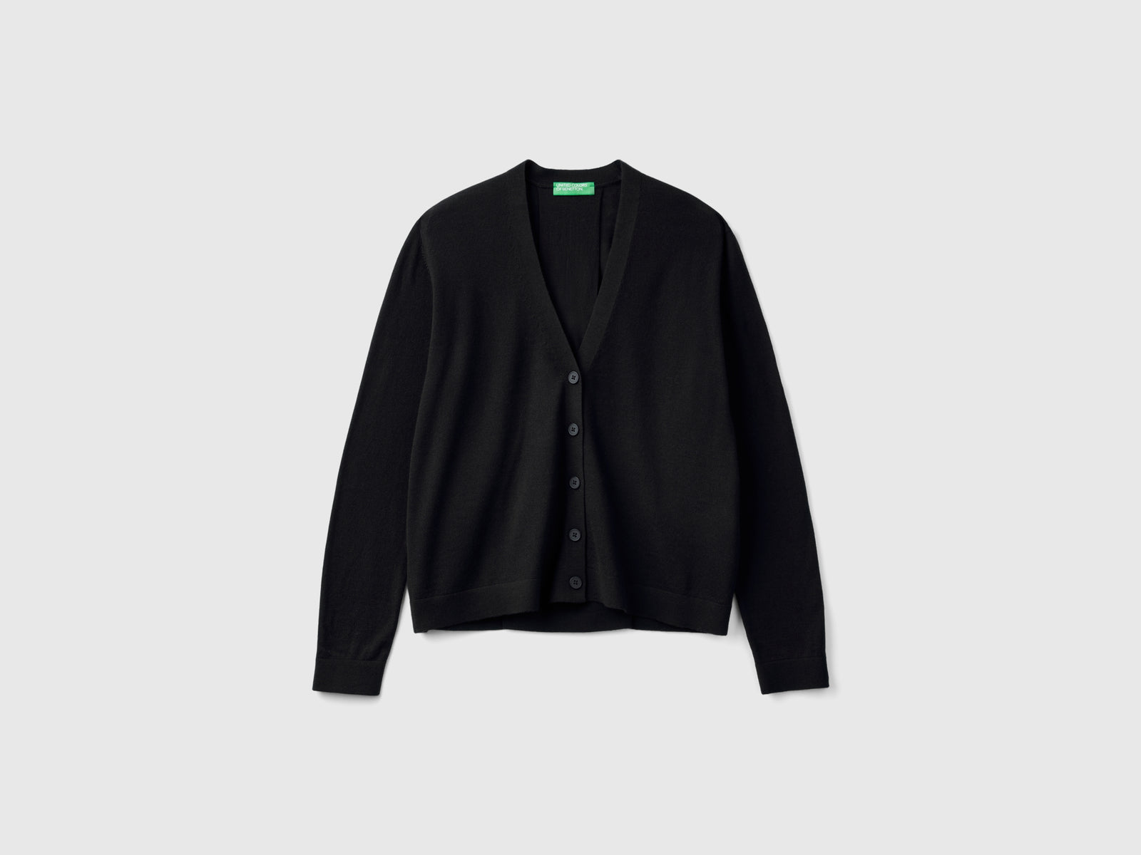 Maglia scollo a V in pura lana Merino da donna nero | Benetton Outlet