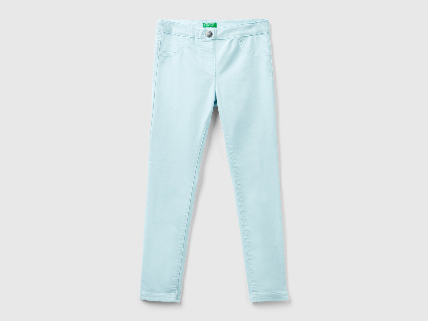 Pantaloni super skinny da bambina azzurro | Benetton Outlet