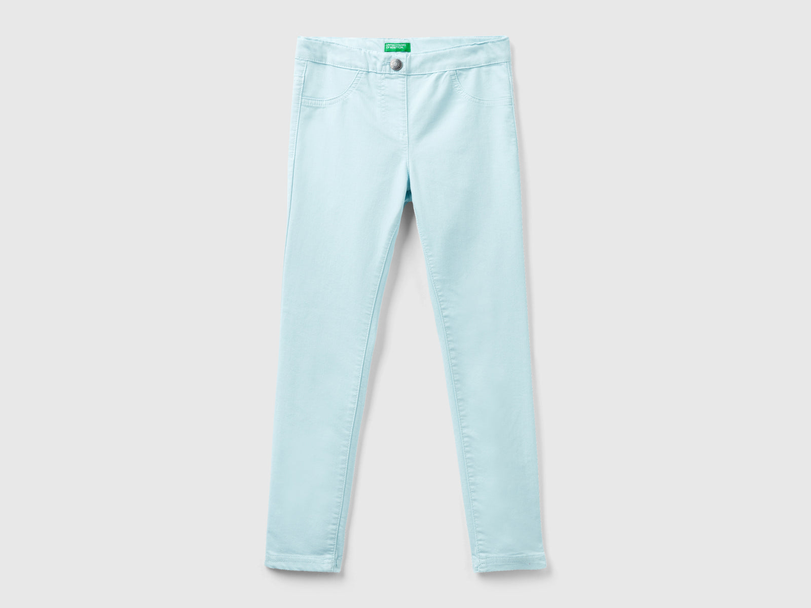 Pantaloni super skinny da bambina azzurro | Benetton Outlet