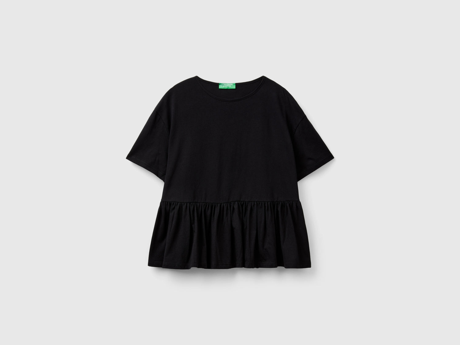 T-shirt boxy fit con balza da donna nero | Benetton Outlet