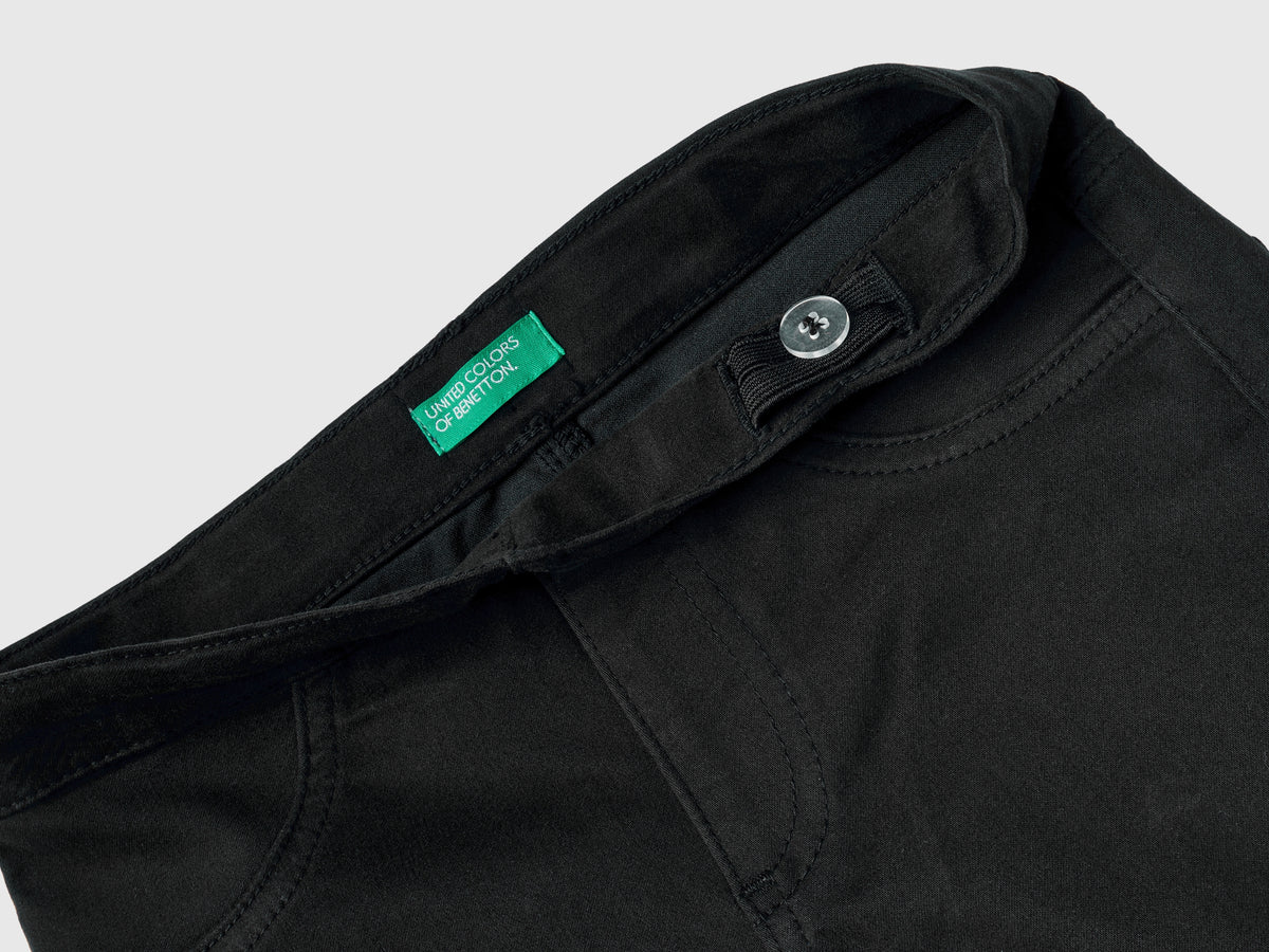 Pantaloni a zampa elasticizzati