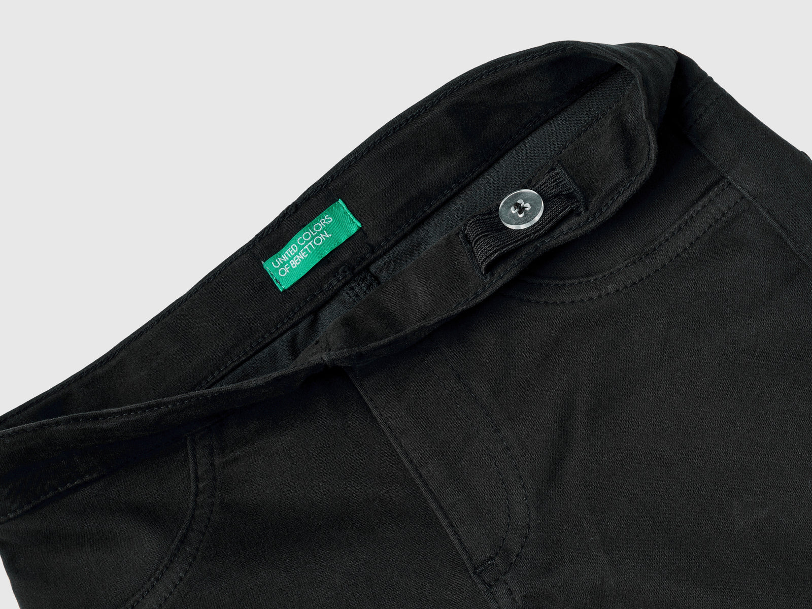 Pantaloni a zampa elasticizzati da bambina nero 3 | Benetton Outlet