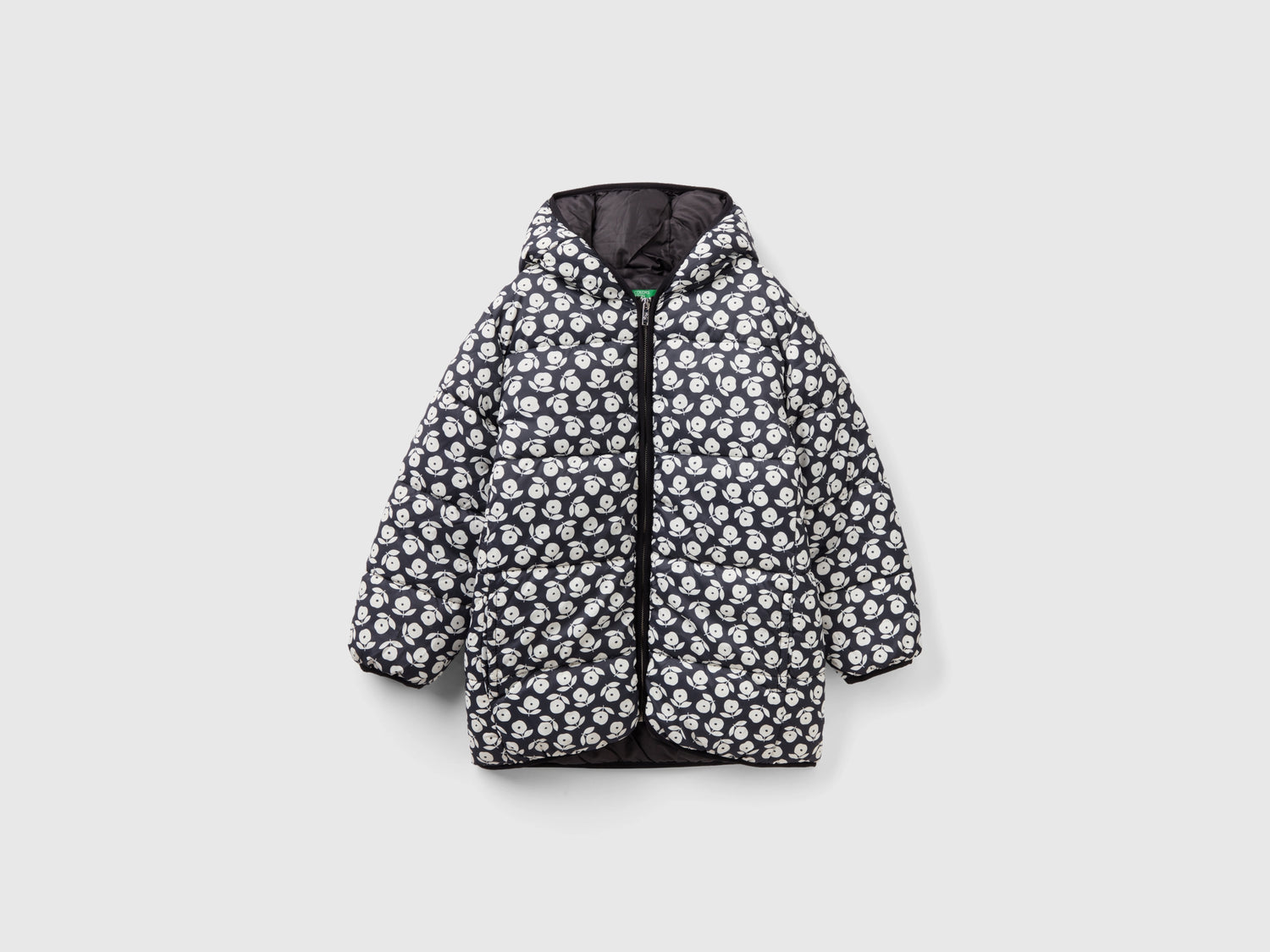 Giubbotto over fit con stampa a fiori da bambina nero | Benetton Outlet