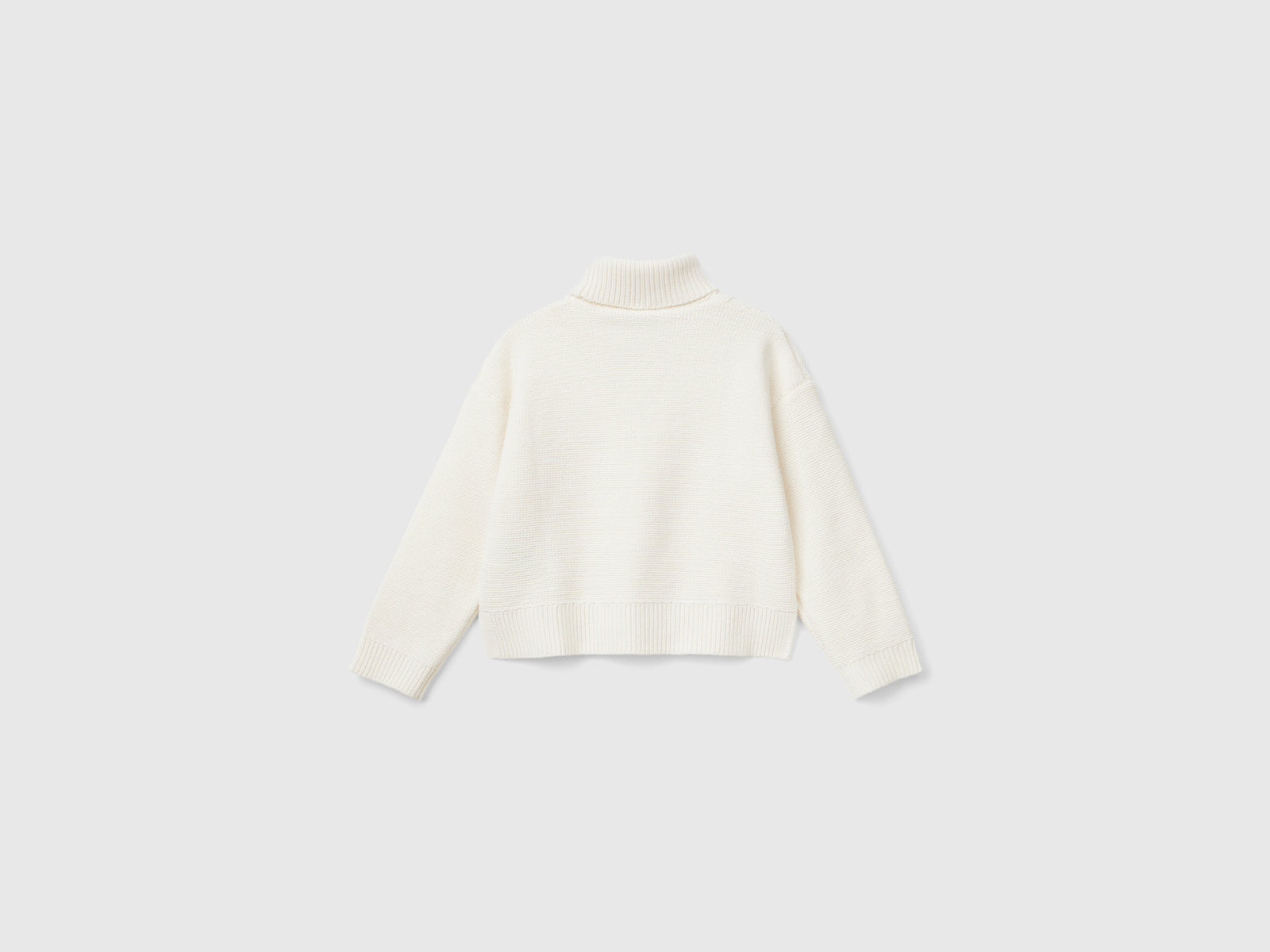 Maglia dolcevita a losanghe da bambina bianco panna 2 | Benetton Outlet