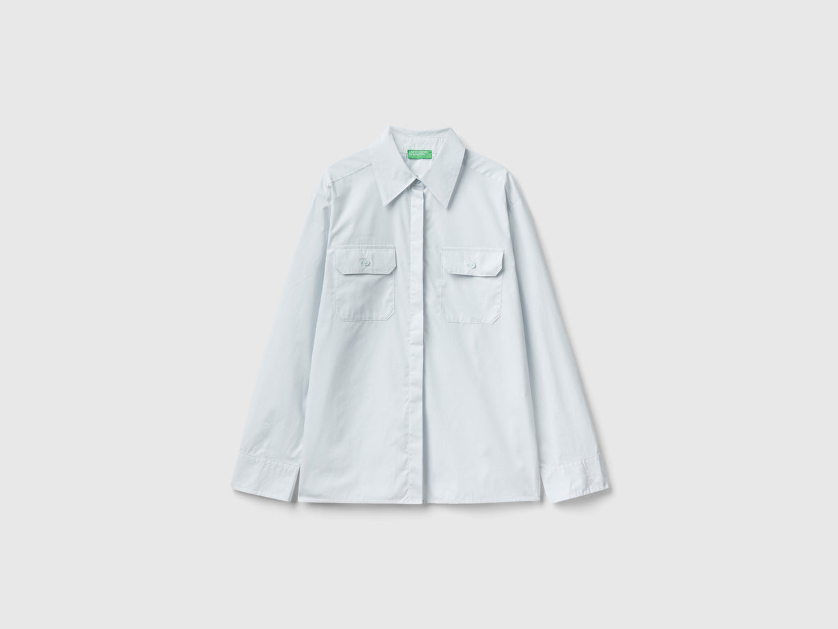 Camicia con tasche e spacchi