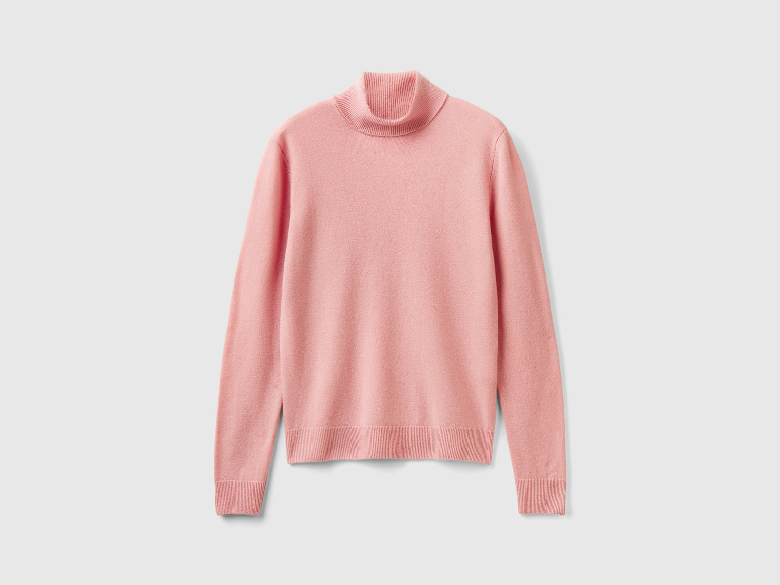 Maglione dolcevita in pura lana Merino da donna rosa | Benetton Outlet