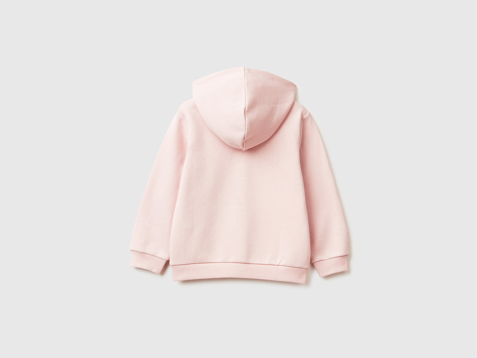 Felpa con zip e paillettes da bimba rosa tenue 2 | Benetton Outlet