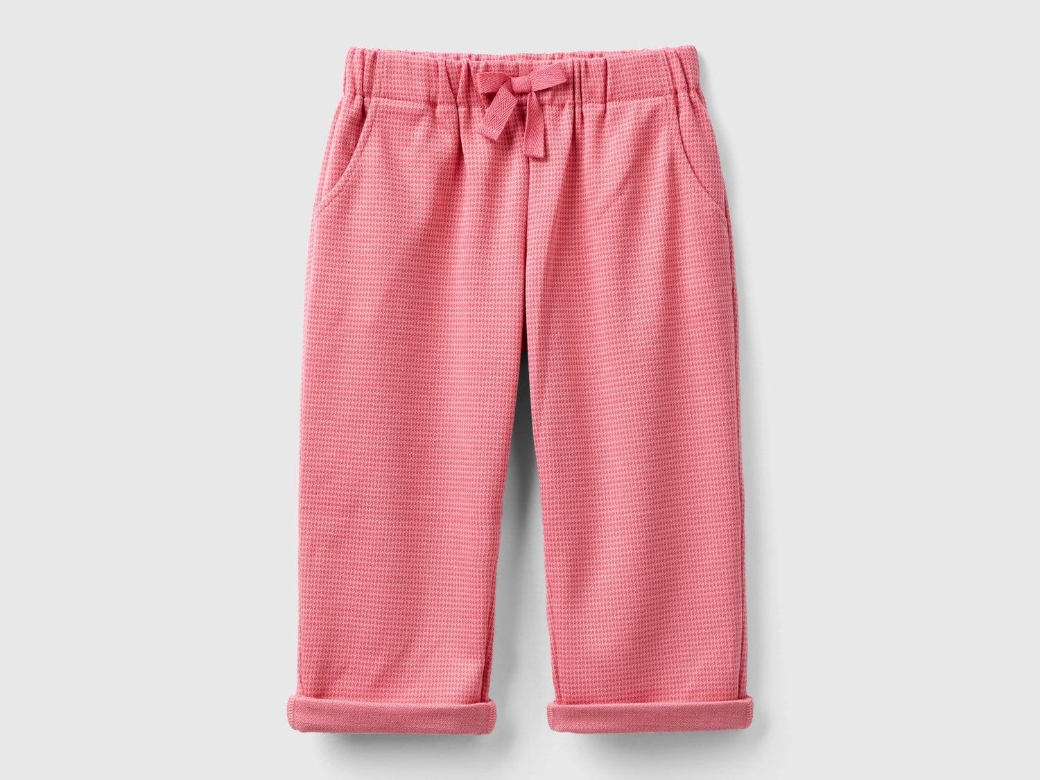 Pantaloni pied de poule con fiocco da bimba rosa | Benetton Outlet