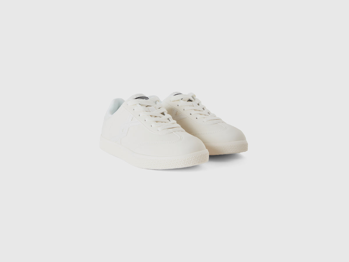 Sneakers in tessuto spalmato