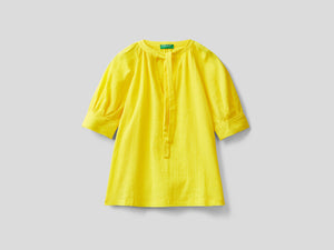 Blusa con fiocco al collo