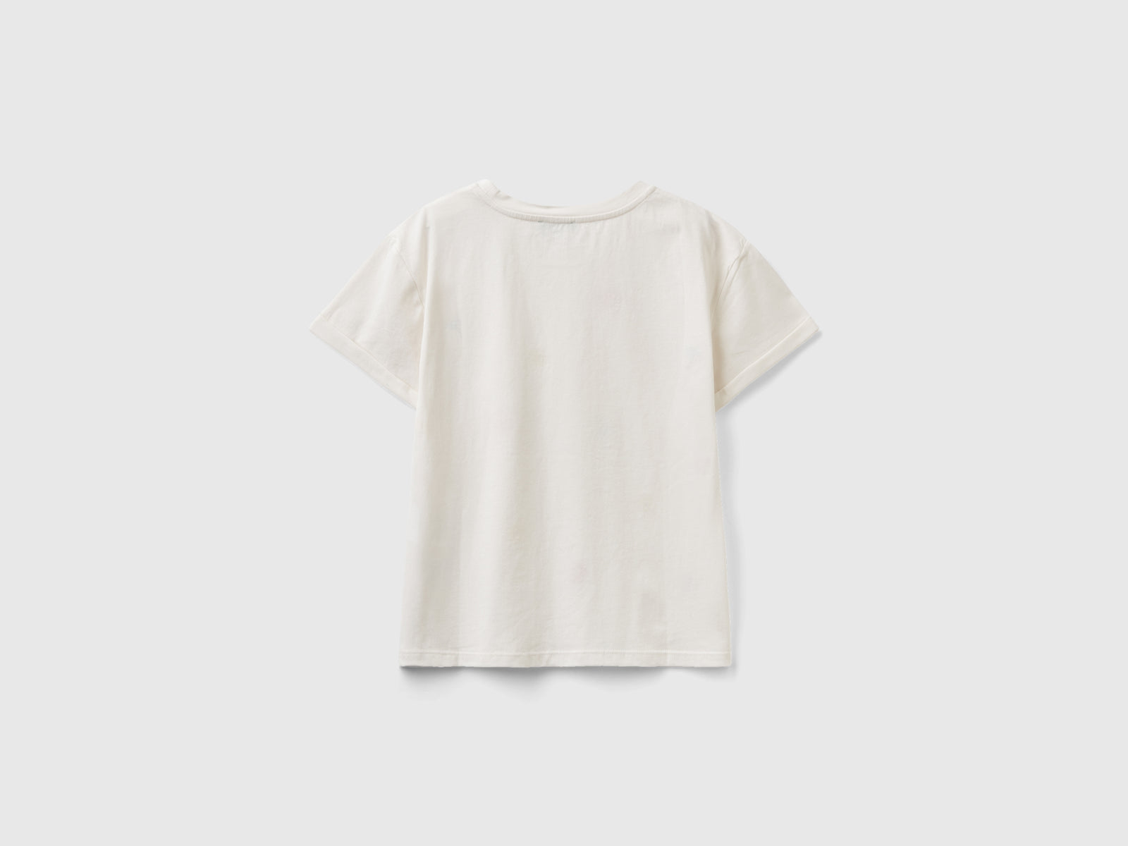 Maglietta con fiori ricamati da bambina bianco panna 2 | Benetton Outlet