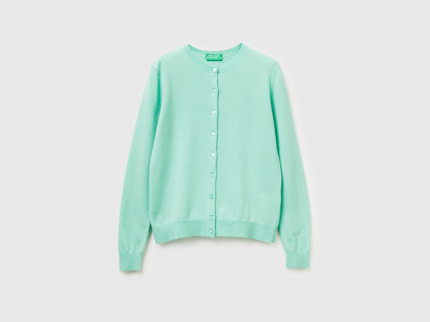 Cardigan girocollo in pura lana Merino da donna verde chiaro | Benetton Outlet