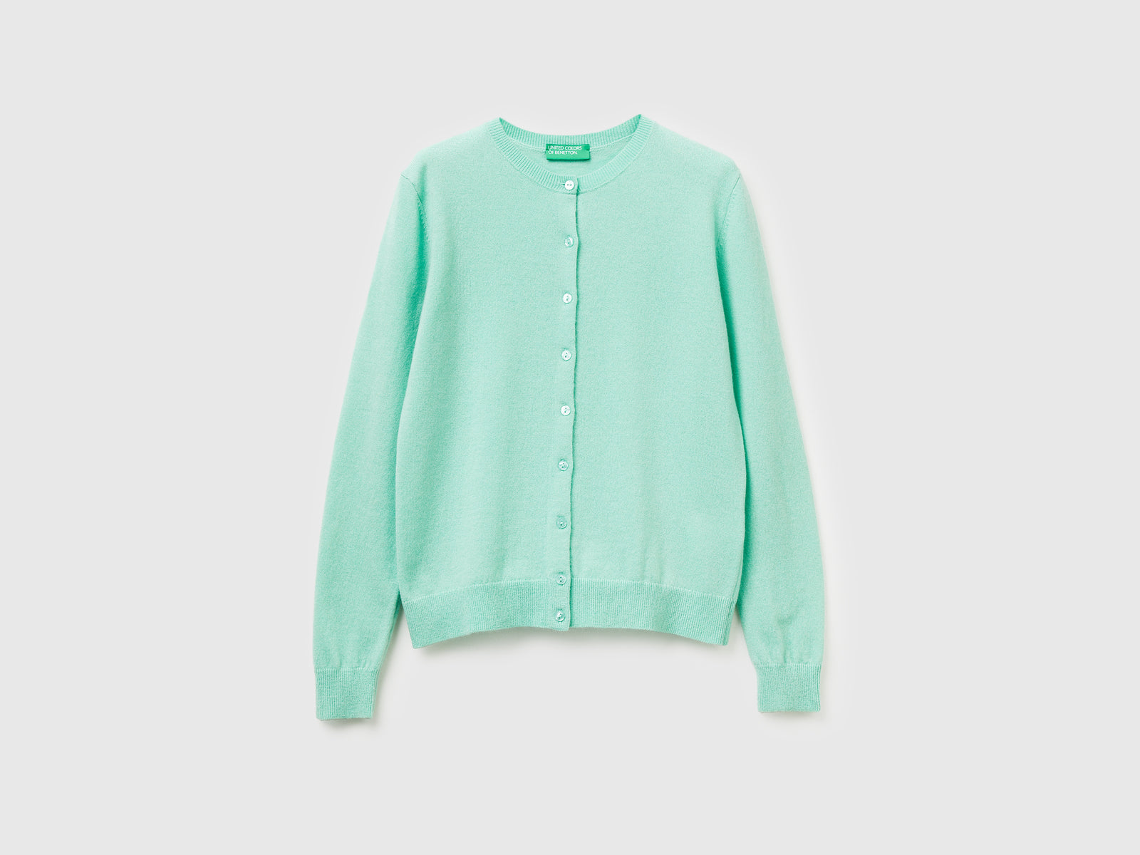 Cardigan girocollo in pura lana Merino da donna verde chiaro | Benetton Outlet
