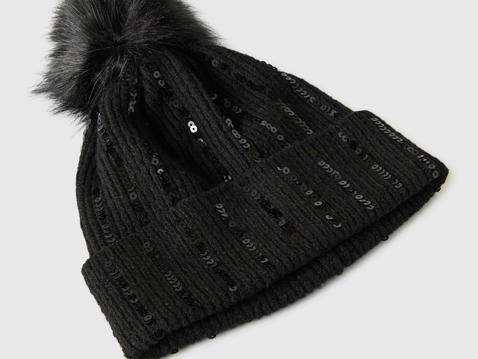 Cappello con pom pom e paillettes da bambina nero 3 | Benetton Outlet