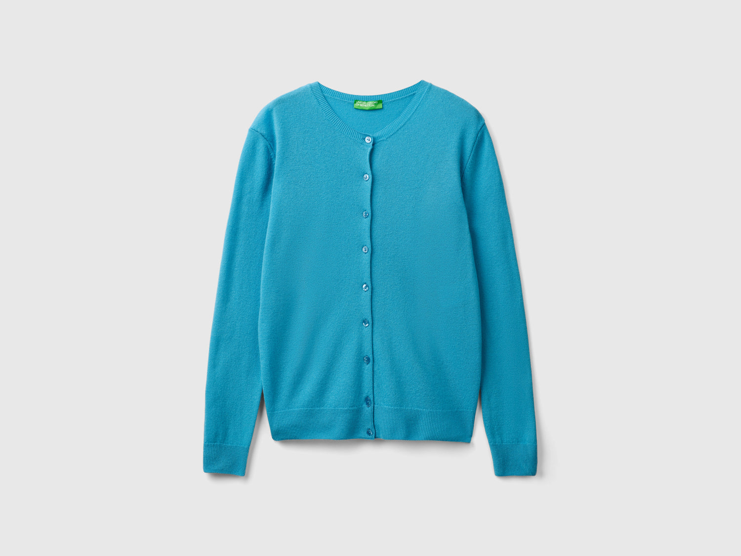 Cardigan girocollo in pura lana Merino da donna azzurro | Benetton Outlet
