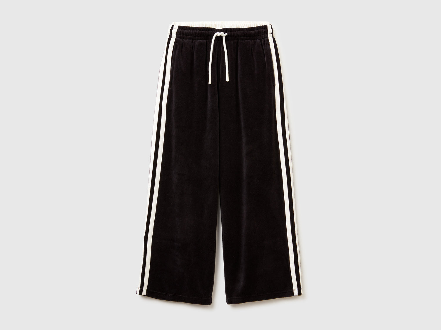 Pantaloni ampi in ciniglia da bambina nero | Benetton Outlet