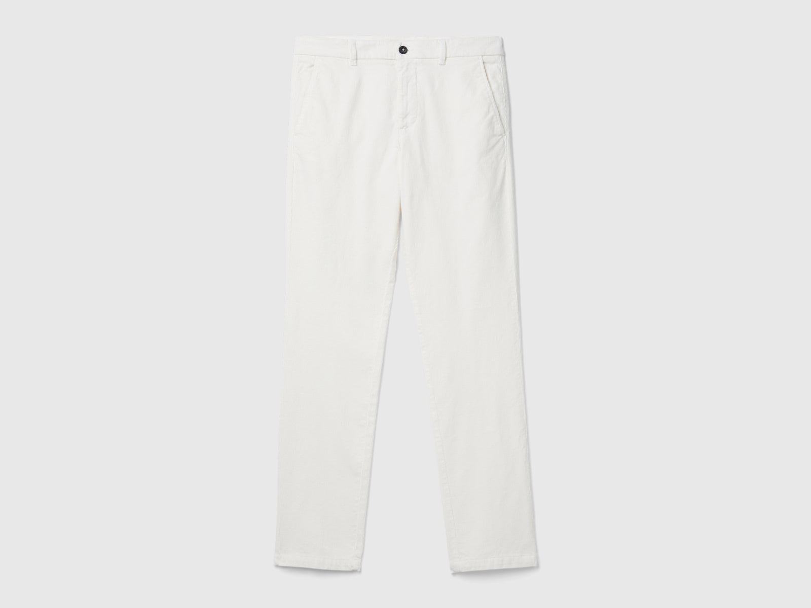 Pantaloni slim fit in velluto stretch da uomo bianco | Benetton Outlet