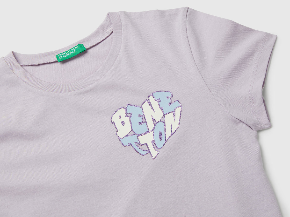 T-shirt con logo glitter