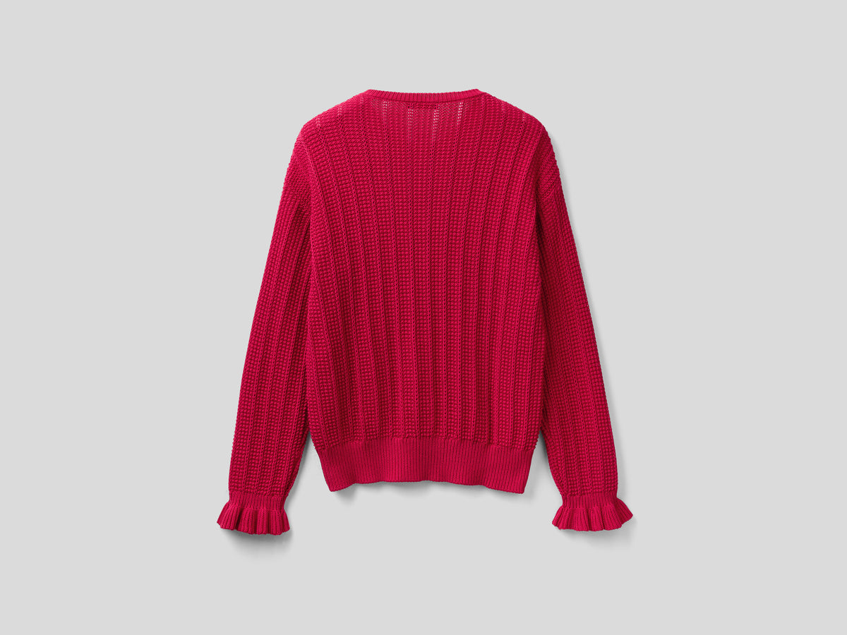 Maglia con rouches e trecce