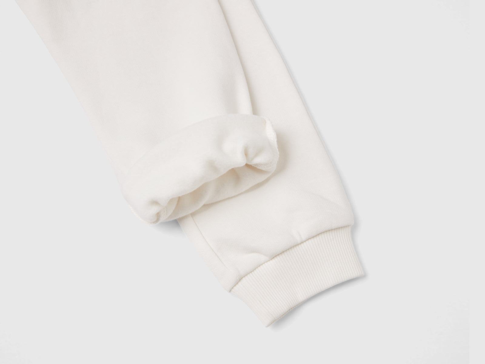 Joggers in felpa con coulisse da bimba bianco panna 2 | Benetton Outlet