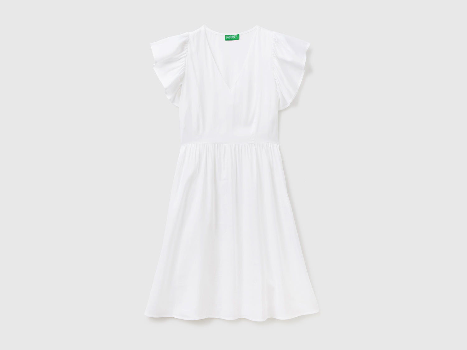 Vestito corto con scollo a V in tessuto fluido e leggero di pura viscosa da donna bianco | Benetton Outlet