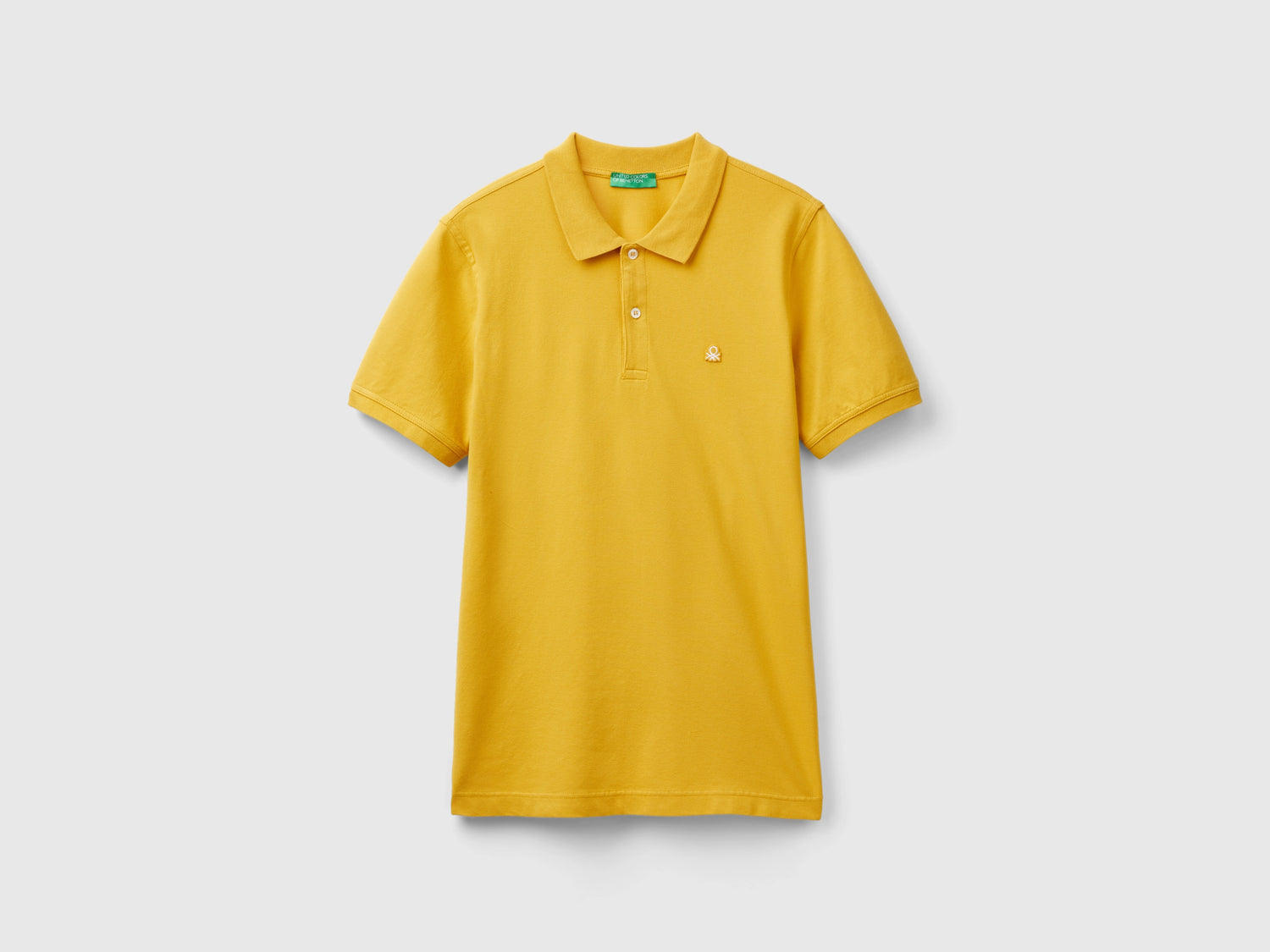Polo giallo ocra slim fit da uomo senape | Benetton Outlet