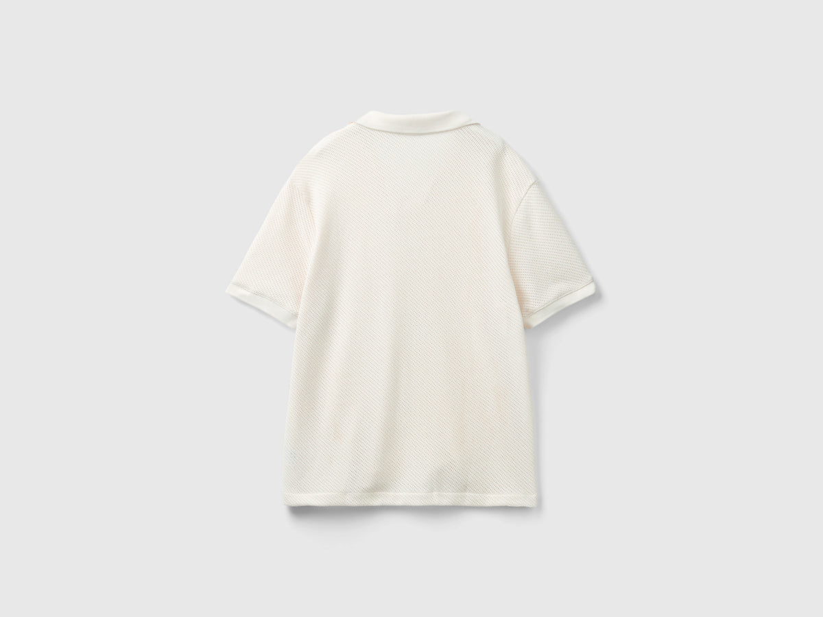 Polo in cotone traforato