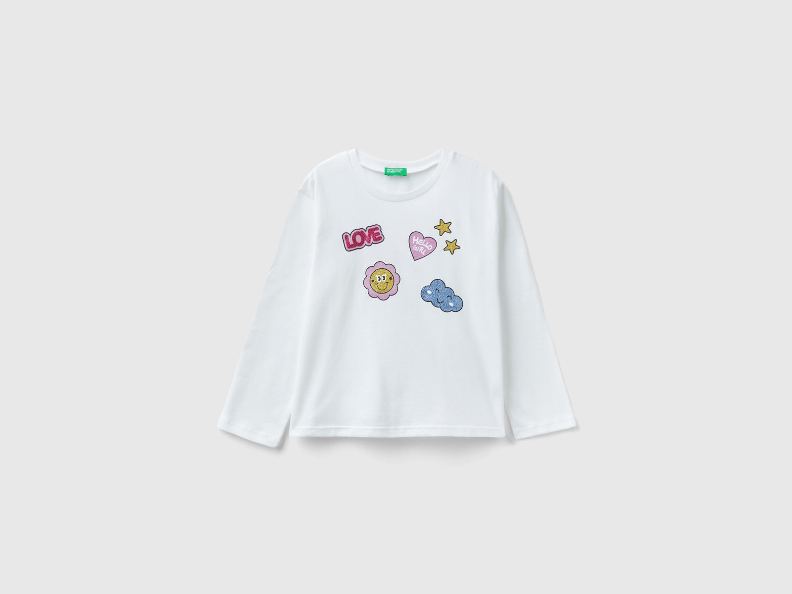 Calda t-shirt con stampa e glitter da bimba bianco panna | Benetton Outlet