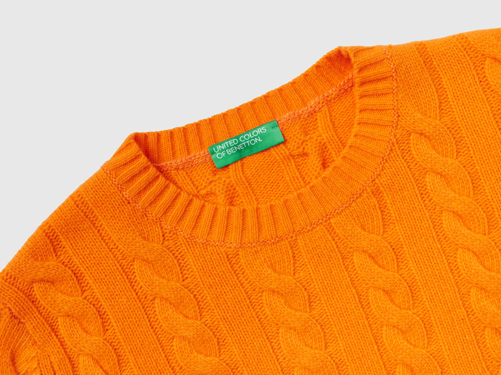 Maglia cropped con trecce da donna arancione 3 | Benetton Outlet