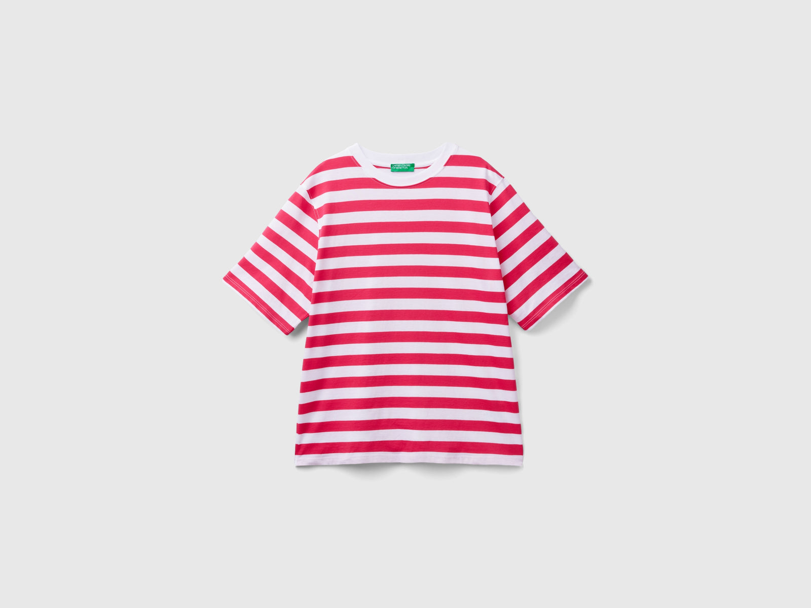 T-shirt a righe comfort fit da donna fucsia | Benetton Outlet