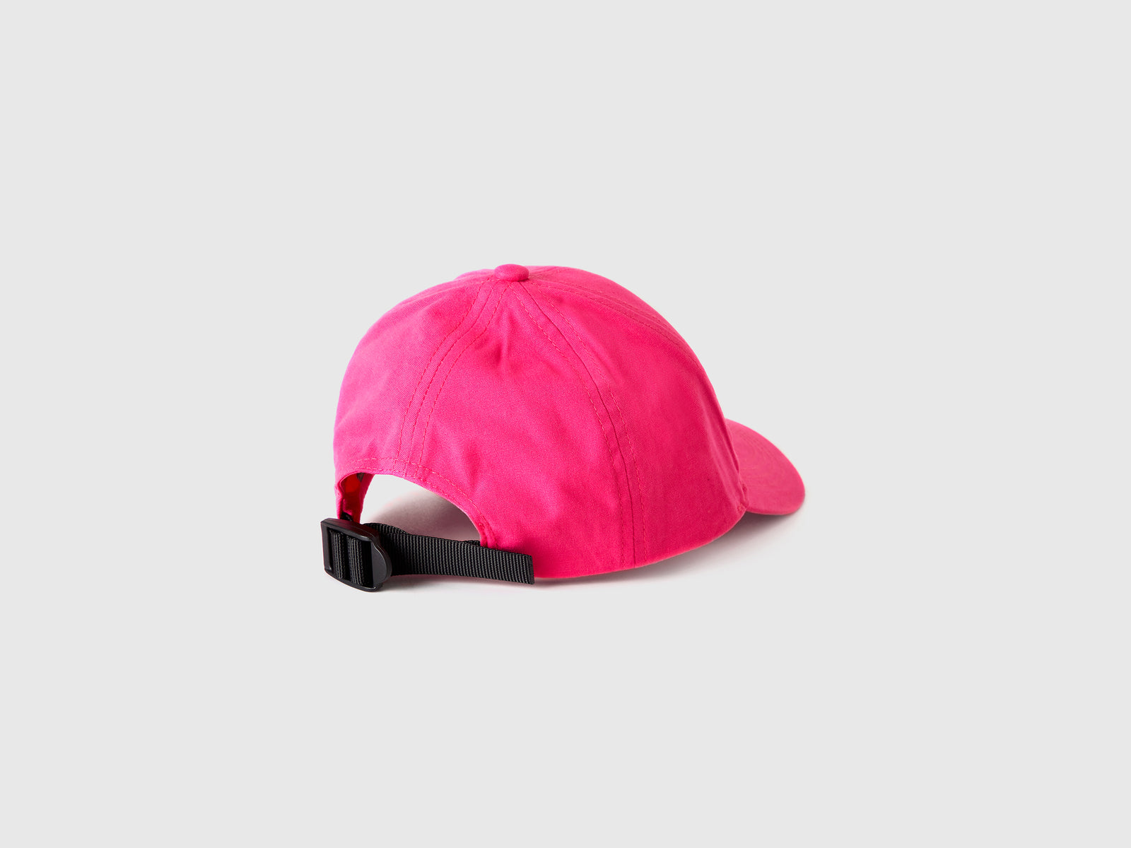 Cappellino con visiera da bimbo fucsia 2 | Benetton Outlet