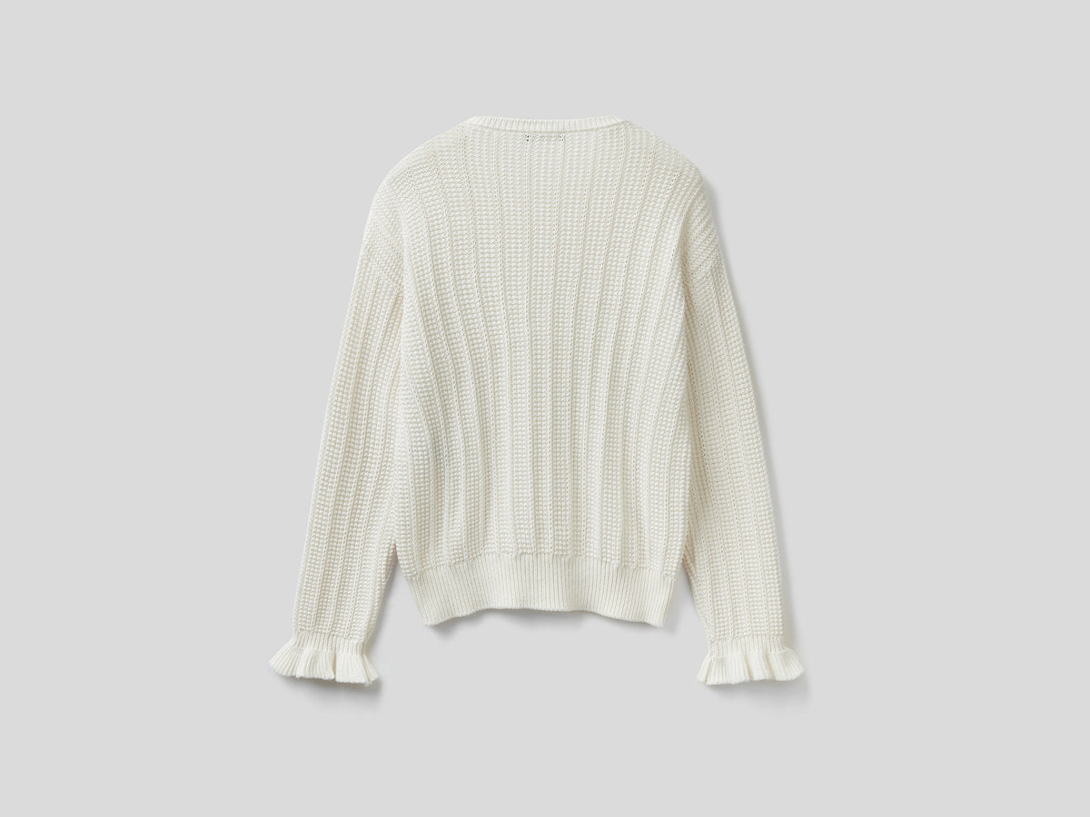 Maglia con rouches e trecce