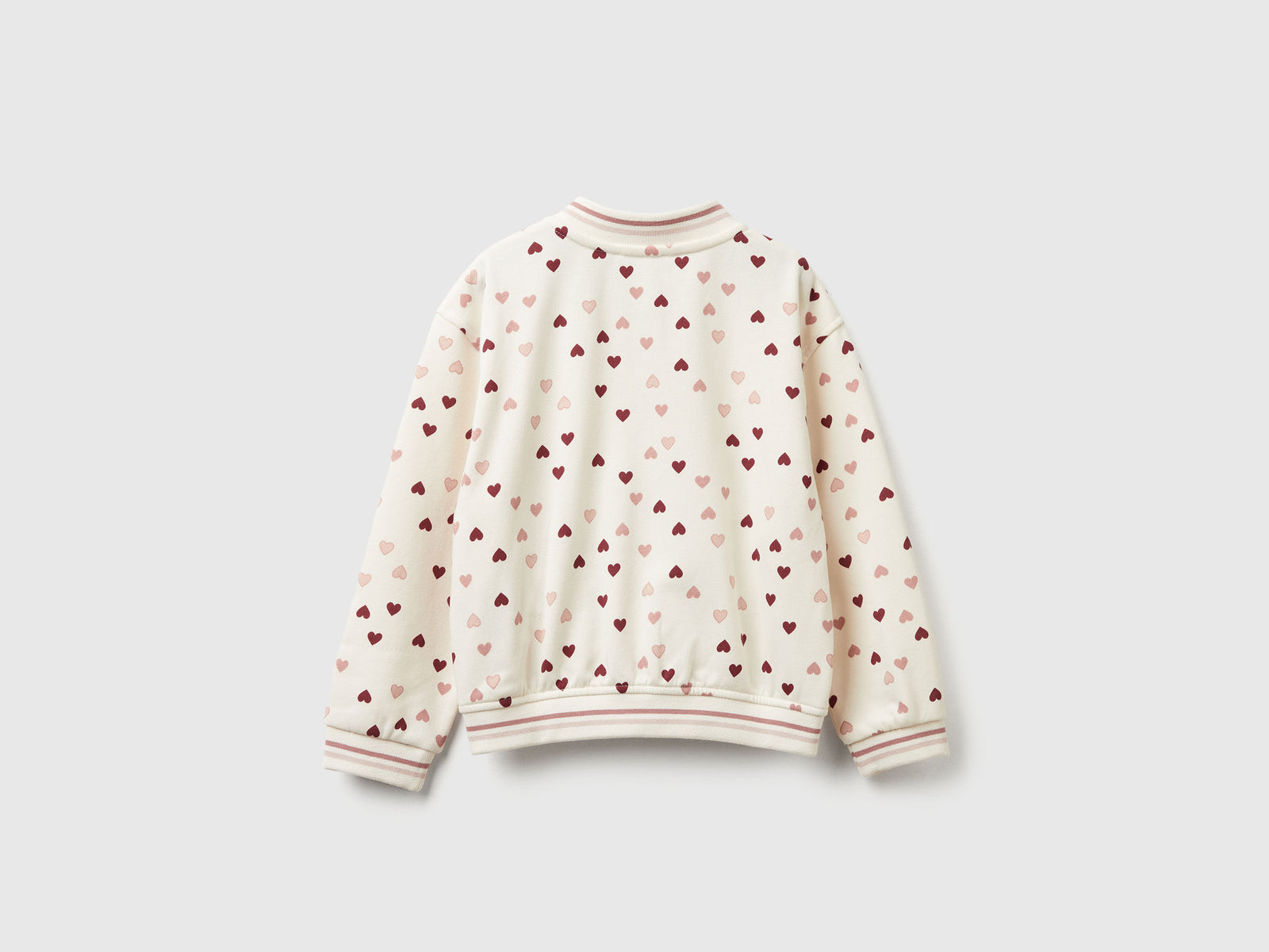 Bomber in felpa con stampa cuori da bimba bianco panna 2 | Benetton Outlet