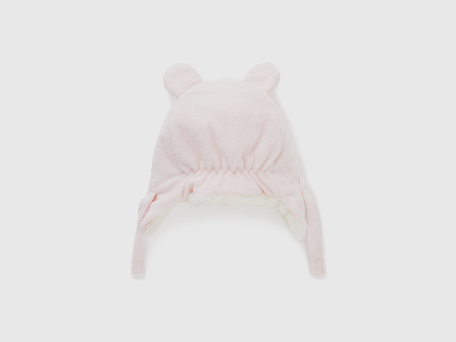 Cappello con paraorecchie in pile da neonato rosa tenue 2 | Benetton Outlet