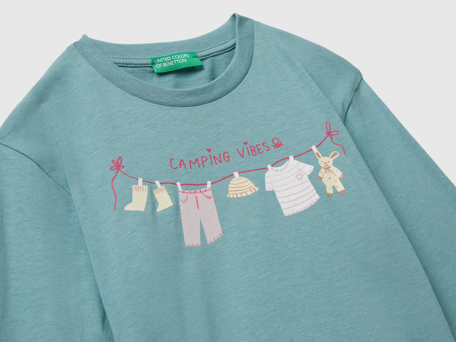 Maglietta in cotone con stampa glitter da bimba celeste 3 | Benetton Outlet