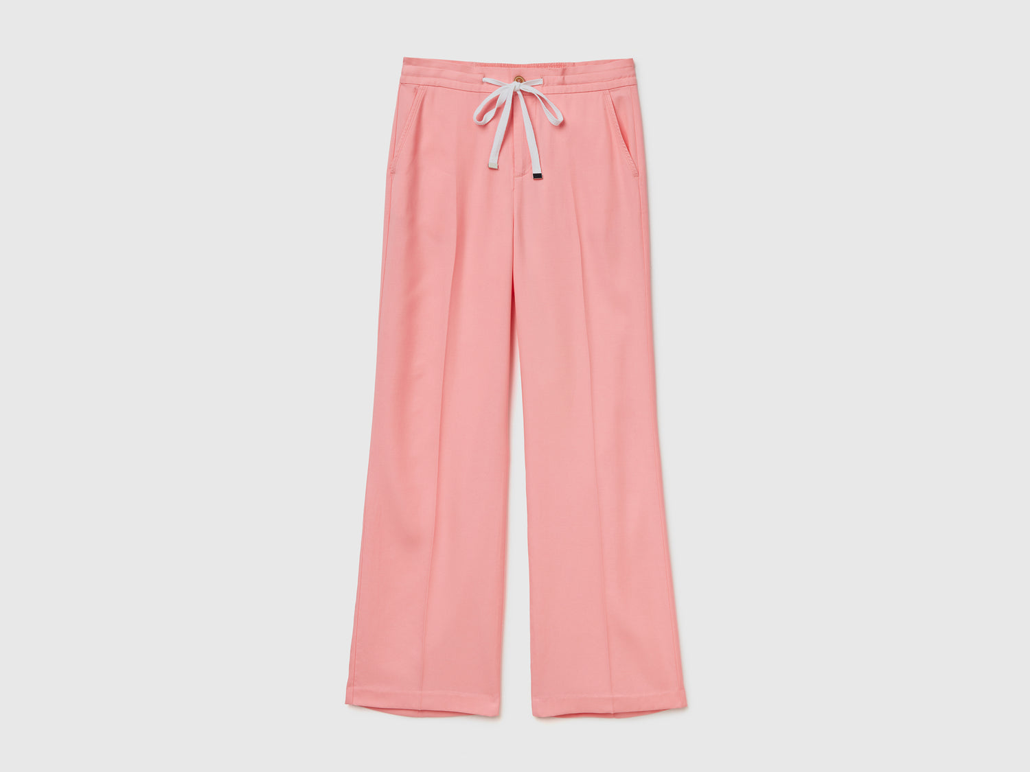 Pantaloni lunghi in lyocell fluido e leggero da donna rosa | Benetton Outlet