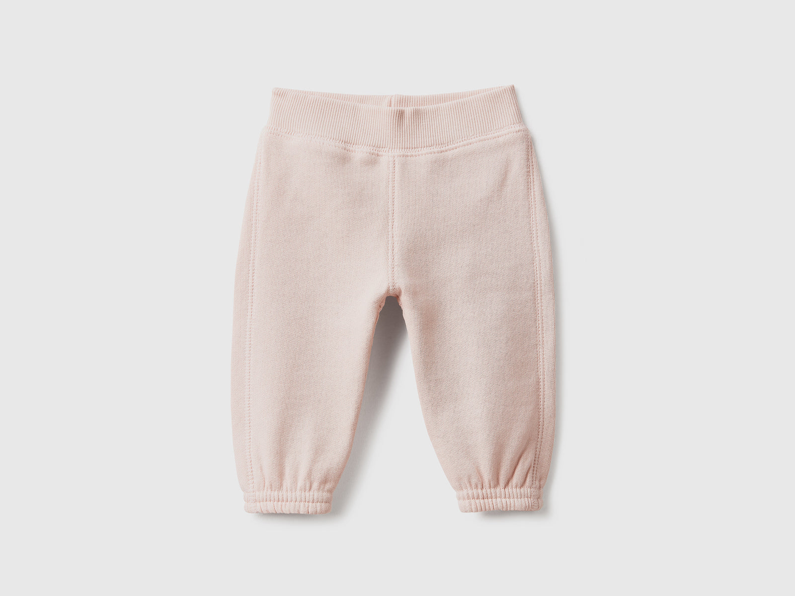 Pantaloni lunghi in felpa di puro cotone da neonato rosa tenue | Benetton Outlet