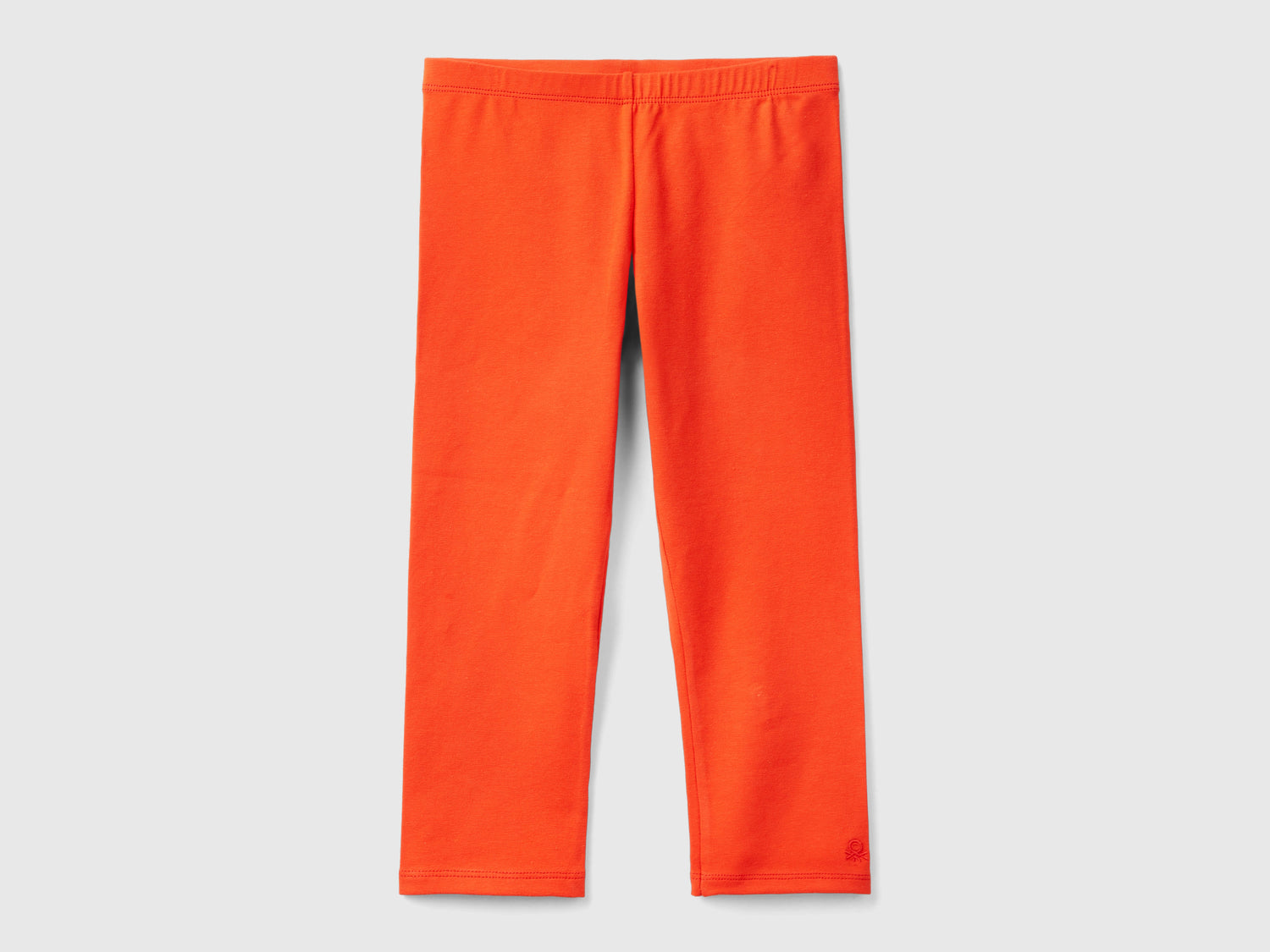 Leggings a 3/4 in cotone elasticizzato da bambina rosso | Benetton Outlet