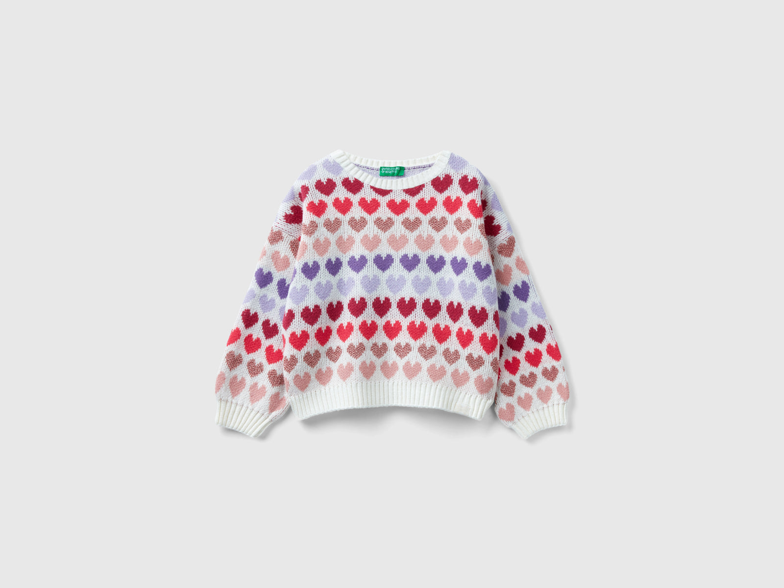 Calda maglia con cuori in lurex da bimba bianco | Benetton Outlet