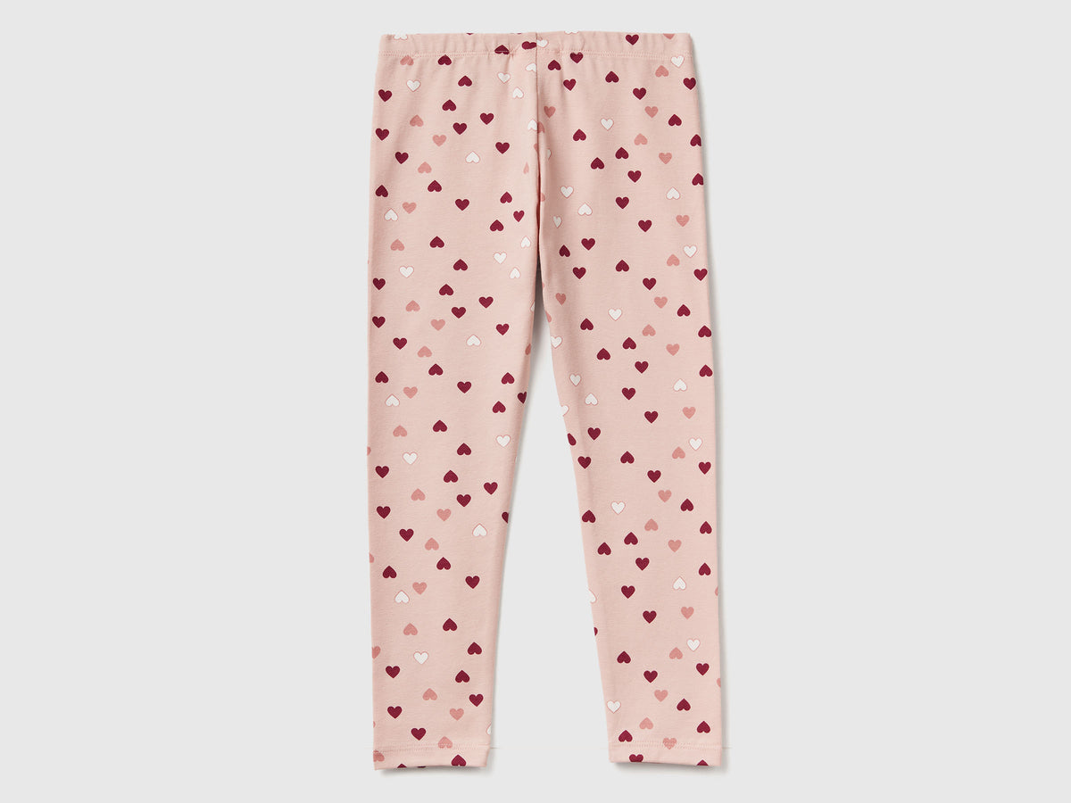 Leggings rosa chiaro a cuori