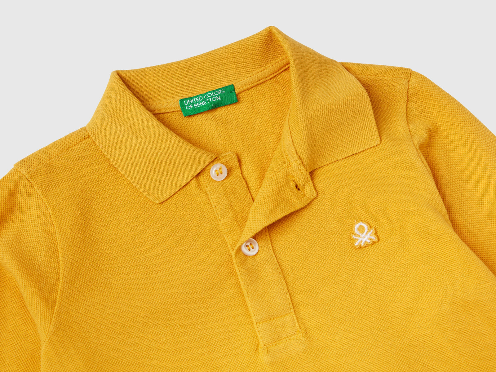 Polo manica lunga in cotone biologico da bimbo giallo 2 | Benetton Outlet