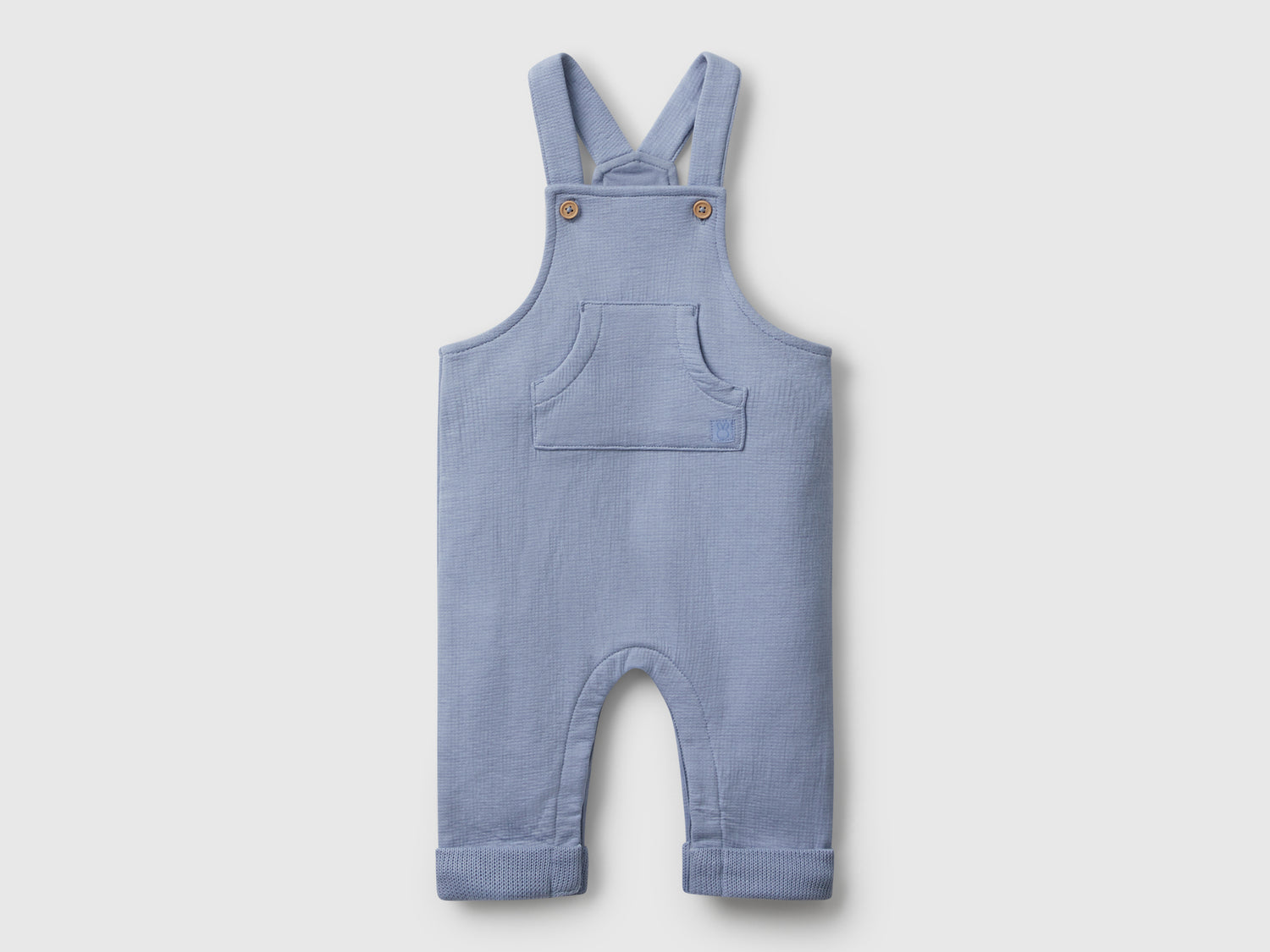 Salopette con tasca da neonato celeste | Benetton Outlet