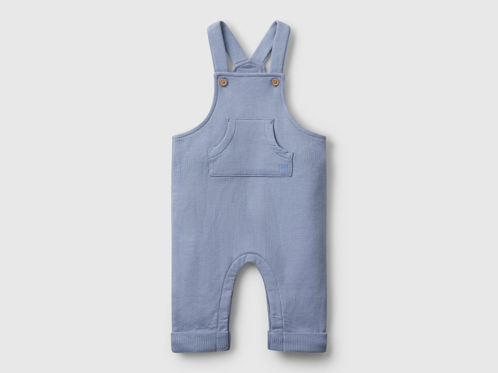 Salopette con tasca da neonato celeste | Benetton Outlet