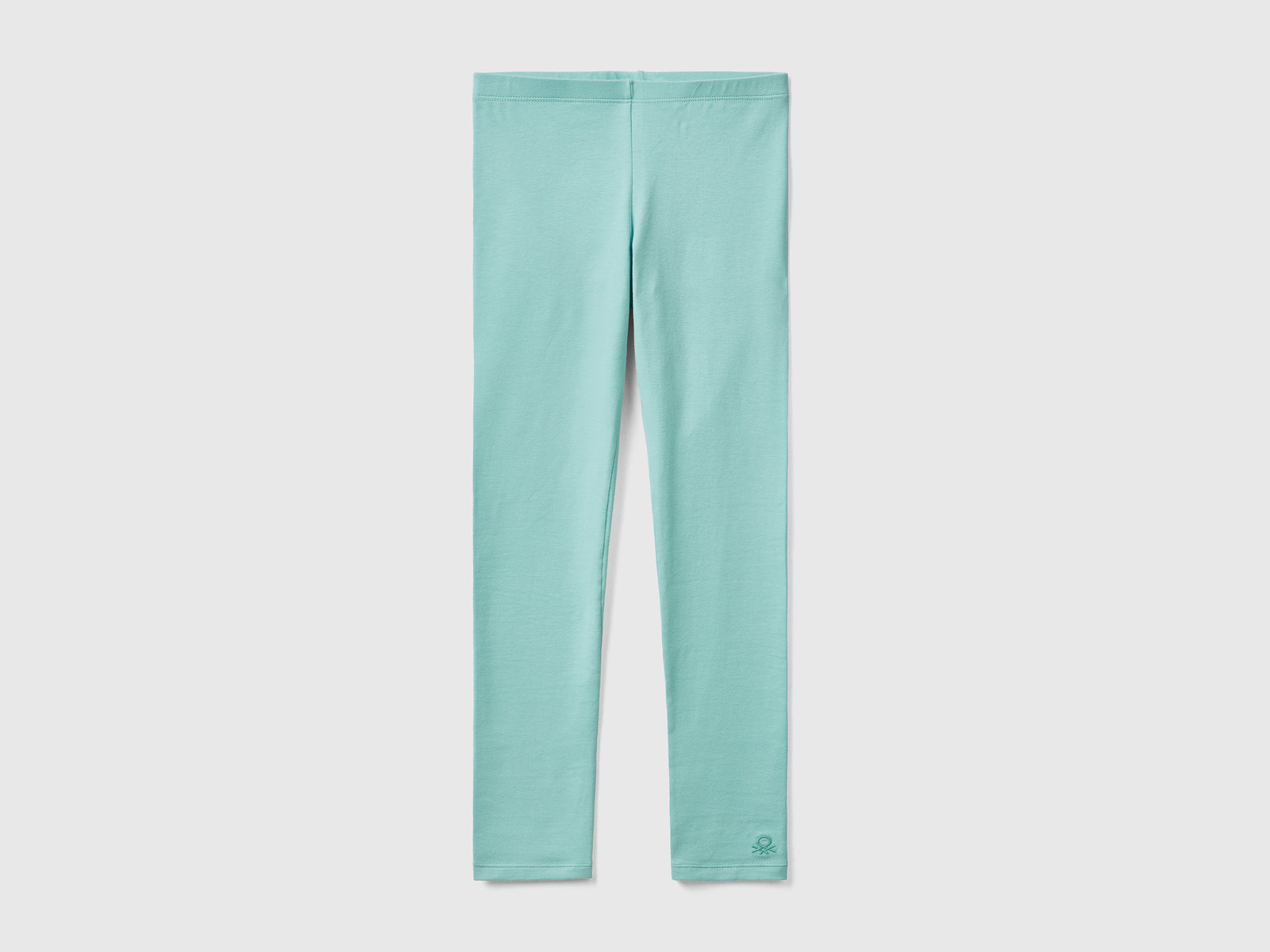 Leggings in cotone stretch con logo da bambina verde chiaro | Benetton Outlet