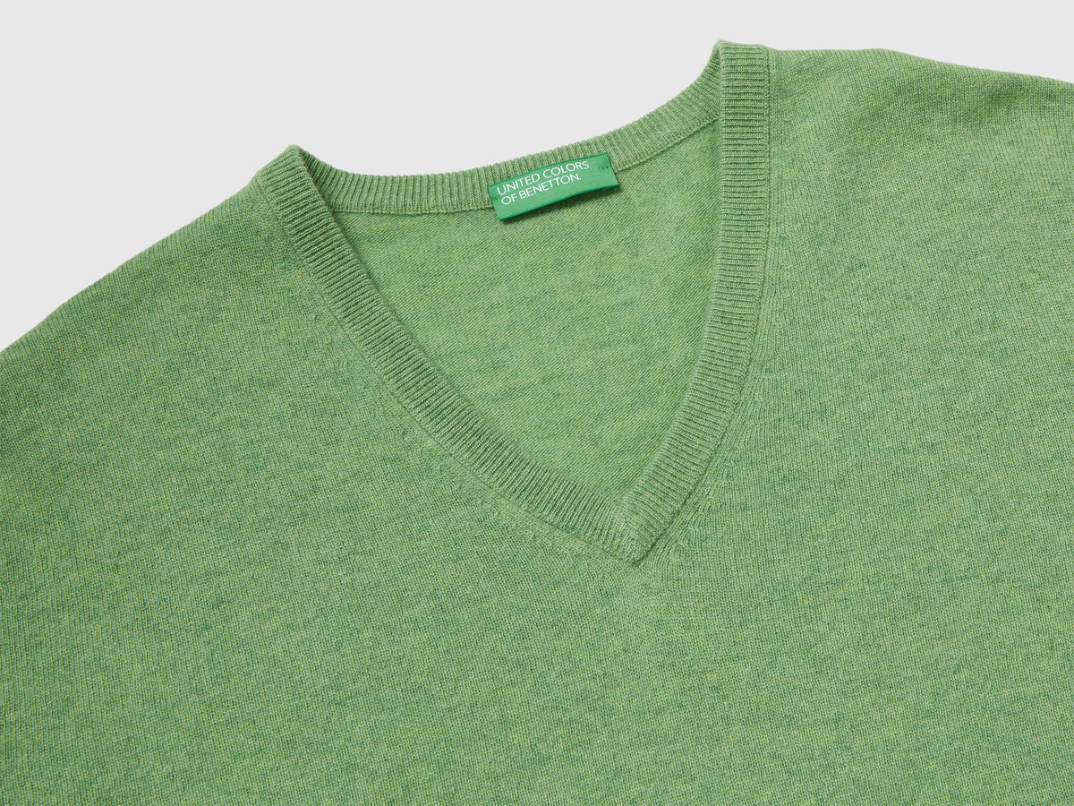 Maglia scollo a V mélange in pura lana Merino
