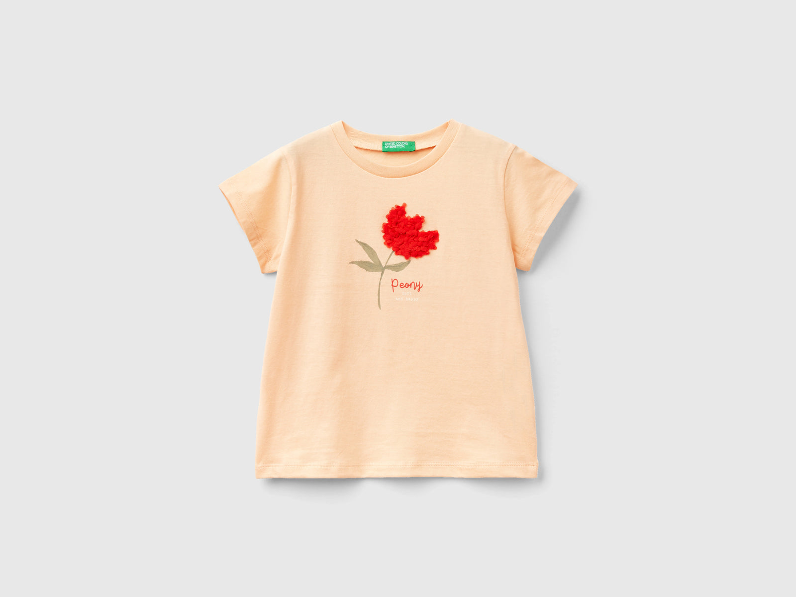 T-shirt con applicazione effetto petali da bimba pesca | Benetton Outlet