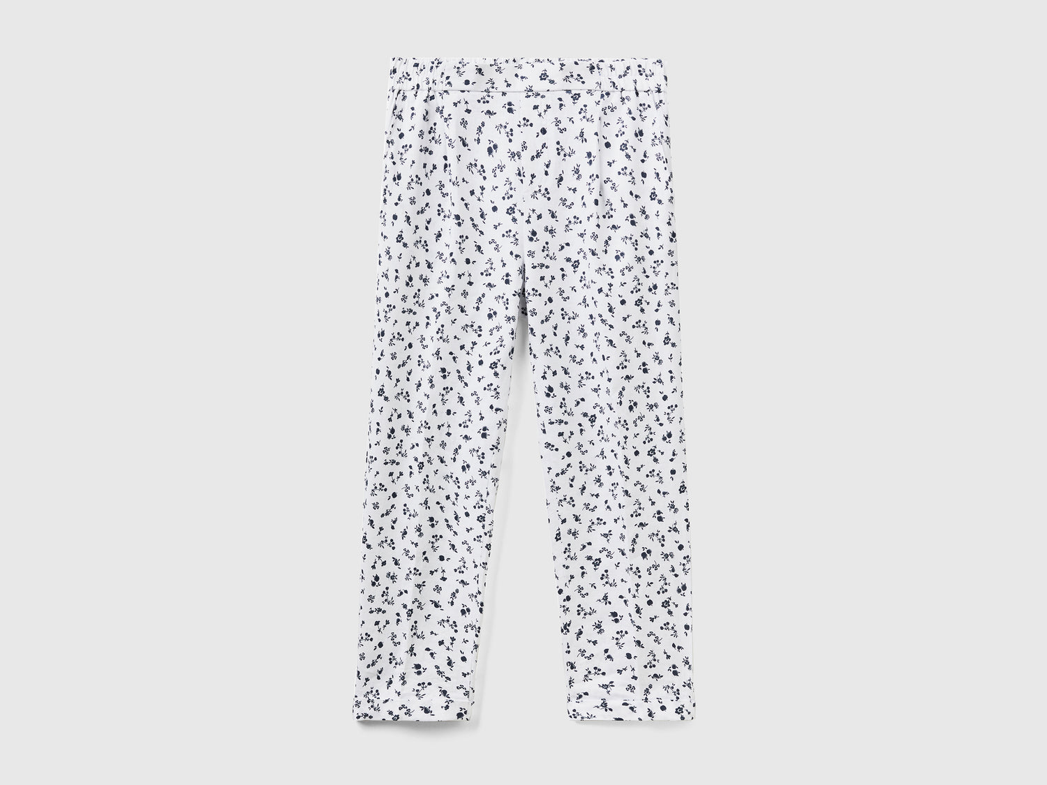 Pantaloni lunghi con stampa fantasia da donna bianco | Benetton Outlet