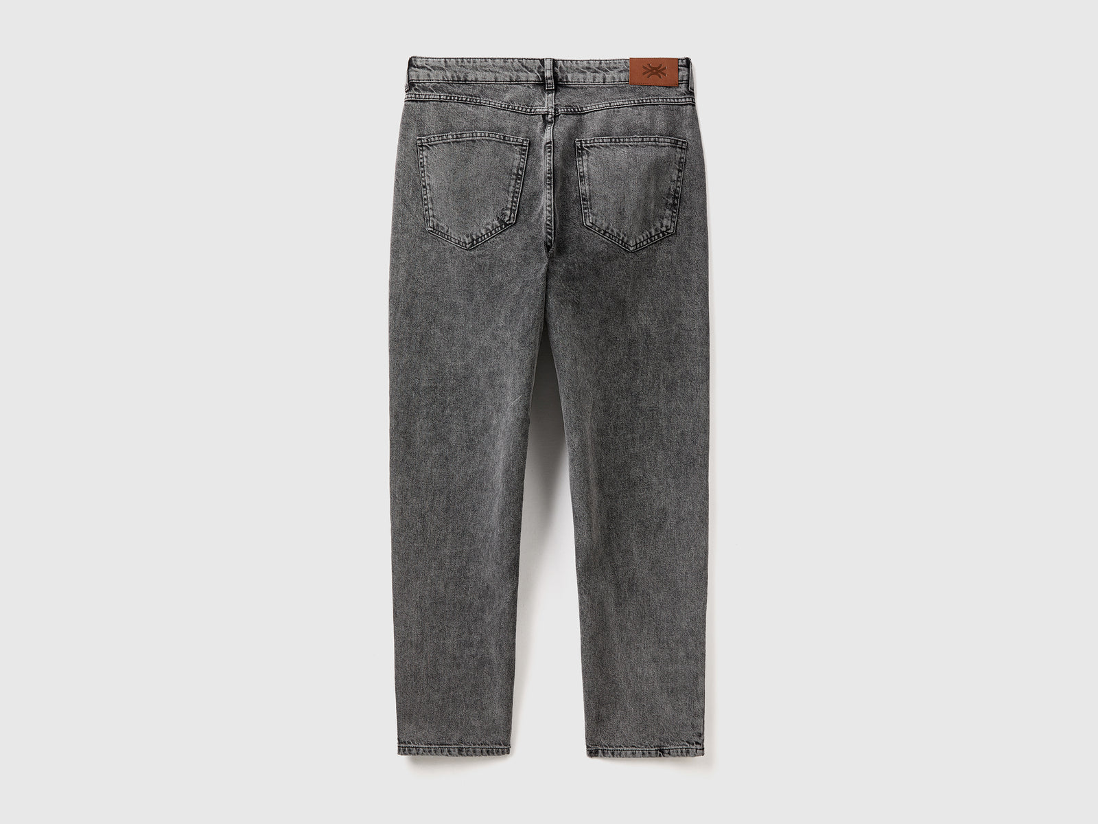 Jeans cinque tasche effetto used da uomo nero 2 | Benetton Outlet