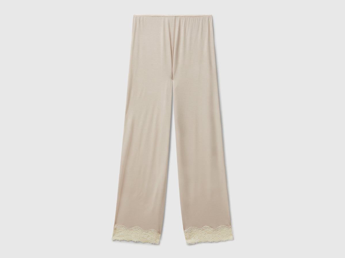 Pantaloni fluidi con pizzo